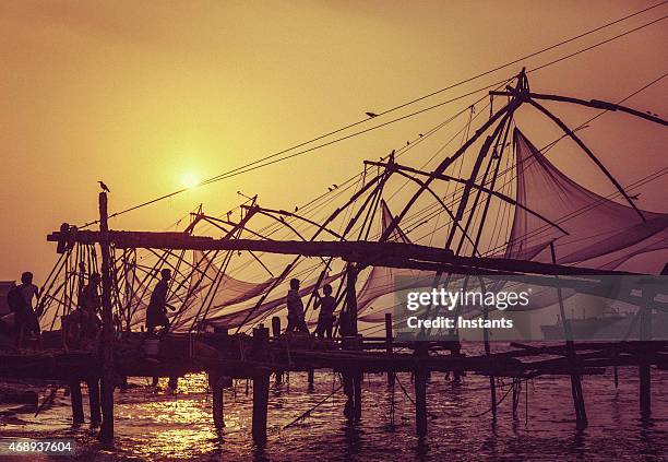 kochi chinese fishing nets - indian ocean stock pictures, royalty-free photos & images