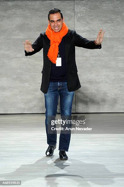 Designer Bibhu Mohapatra walks the runway at the Bibhu Mohapatra fashion show during Mercedes-Benz Fashion Week Fall 2014 at The Pavilion at Lincoln...