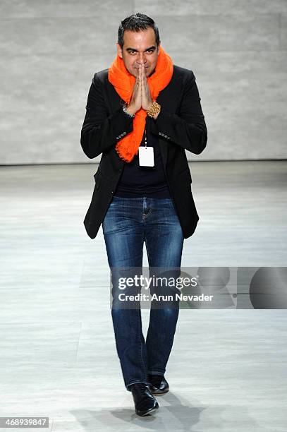 Designer Bibhu Mohapatra walks the runway at the Bibhu Mohapatra fashion show during Mercedes-Benz Fashion Week Fall 2014 at The Pavilion at Lincoln...