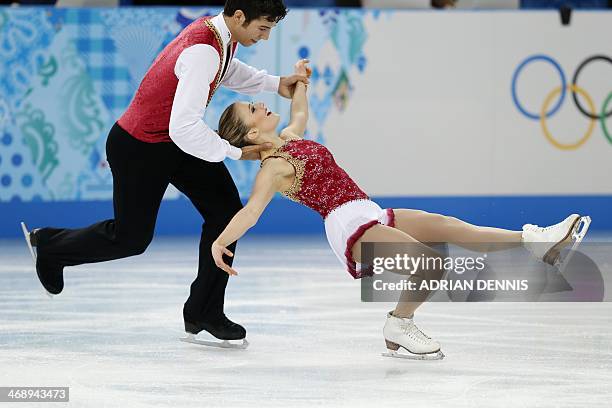 Canada's Rudi Swiegers and Canada's Paige Lawrence perform their Figure Skating Pairs Free Program at the Iceberg Skating Palace during the Sochi...