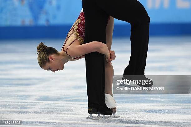 Canada's Rudi Swiegers and Canada's Paige Lawrence perform their Figure Skating Pairs Free Program at the Iceberg Skating Palace during the Sochi...