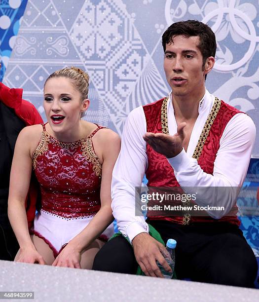 Paige Lawrence and Rudi Swiegers of Canada wait for their score during the Figure Skating Pairs Free Skating during day five of the 2014 Sochi...