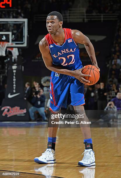 Guard Andrew Wiggins of the Kansas Jayhawks looks to pass the ball against the Kansas State Wildcats during the first half on February 10, 2014 at...