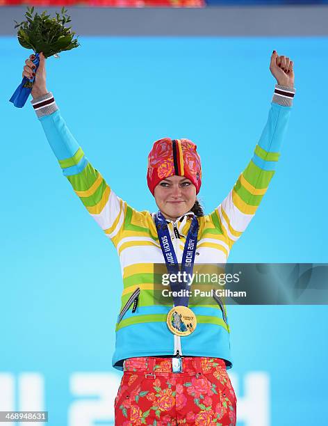 Gold medalist Carina Vogt of Germany celebrates during the medal ceremony for the Ladies' Normal Hill Individual on day five of the Sochi 2014 Winter...