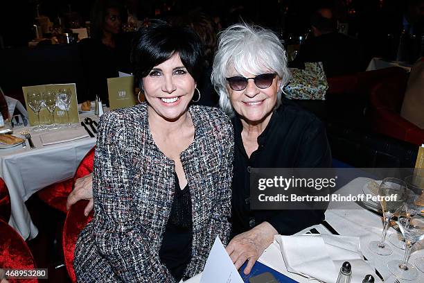 Singers Liane Foly and Catherine Lara attend the 'Paris Merveilles', Lido New Revue : Opening Gala on April 8, 2015 in Paris, France.