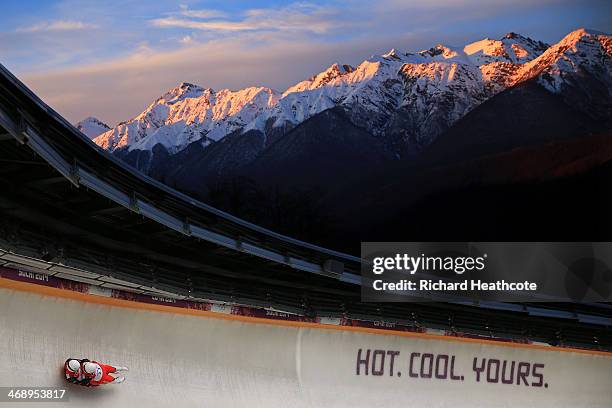 Peter Penz and Georg Fischler of Austria make a run during the Men's Luge Doubles on Day 5 of the Sochi 2014 Winter Olympics at Sliding Center Sanki...