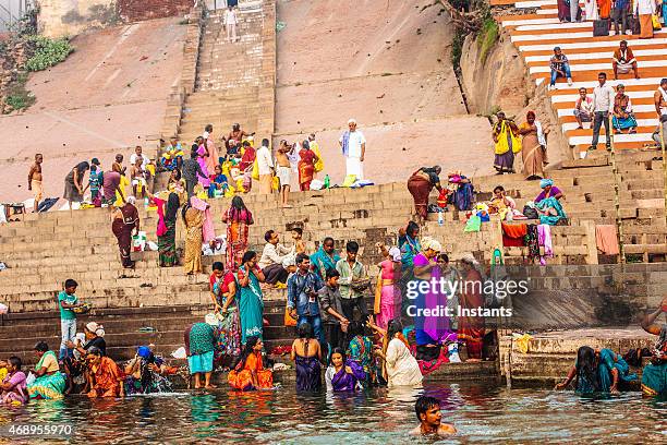 ganges river bathers - traditional ceremony stock pictures, royalty-free photos & images