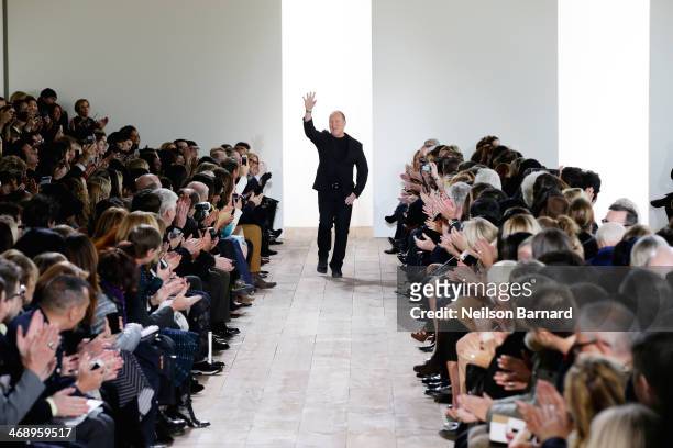 Designer Michael Kors walks the runway at the Michael Kors fashion show during Mercedes-Benz Fashion Week Fall 2014 at Spring Studios on February 12,...