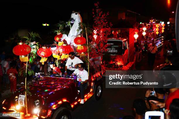 Performers take part in the Singkawang Lantern Festival on February 12, 2014 in Singkawang, Kalimantan, Indonesia. Thousands of performers attended...