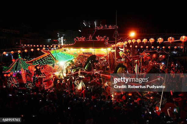 Performers take part in the Singkawang Lantern Festival on February 12, 2014 in Singkawang, Kalimantan, Indonesia. Thousands of performers attended...