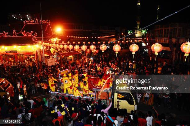 Performers take part in the Singkawang Lantern Festival on February 12, 2014 in Singkawang, Kalimantan, Indonesia. Thousands of performers attended...