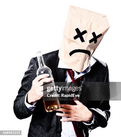 Drunken businessman in paper-bag mask regrets his actions Drunken businessman in paper-bag mask regrets his actions