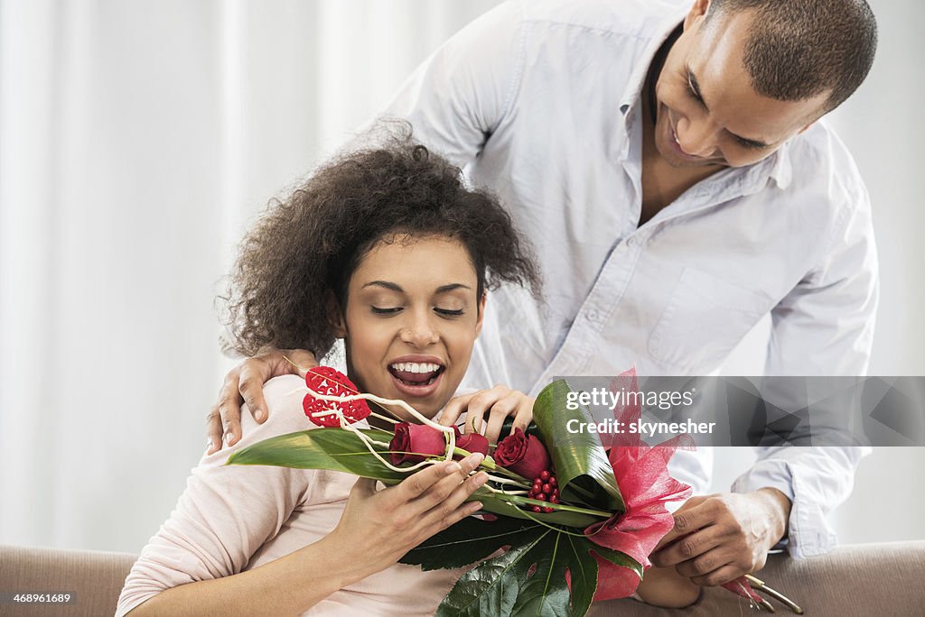 Surprised with a rose bouquet.