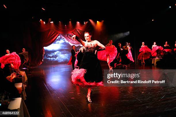Dancers perform on stage during the 'Paris Merveilles', Lido New Revue : Opening Gala on April 8, 2015 in Paris, France.