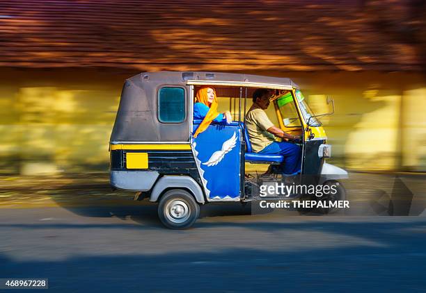 woman riding a tuk tuk taxi - kochi india 個照片及圖片檔