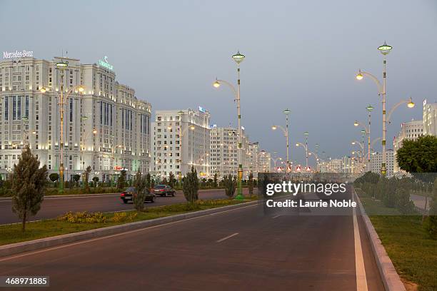 illuminated buildings, ashgabat, turkmenistan - ashgabat turkmenistan fotografías e imágenes de stock