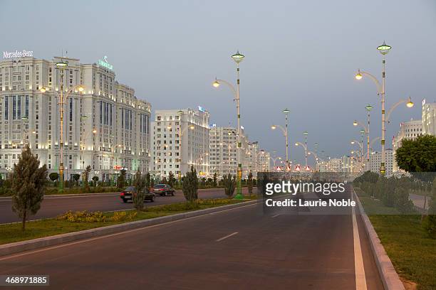 illuminated buildings, ashgabat, turkmenistan - turkmenistan stock pictures, royalty-free photos & images