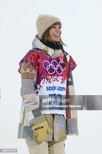 Gold medalist Kaitlyn Farrington of the United States celebrates during the flower ceremony for the Snowboard Women's Halfpipe Finals on day five of...