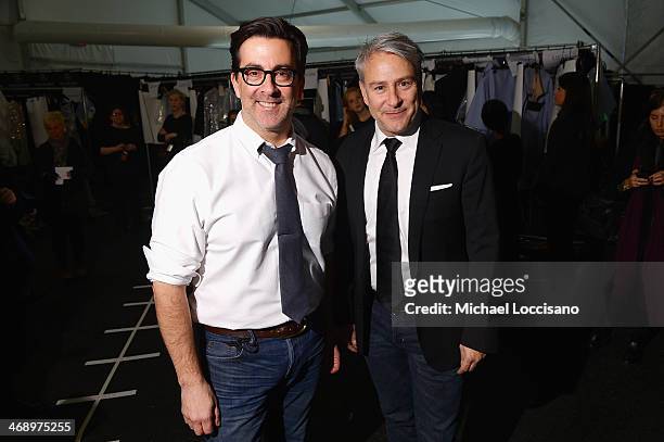 Designers Isaac Franco and Ken Kaufman backstage at the Kaufmanfranco fashion show during Mercedes-Benz Fashion Week Fall 2014 at The Theatre at...