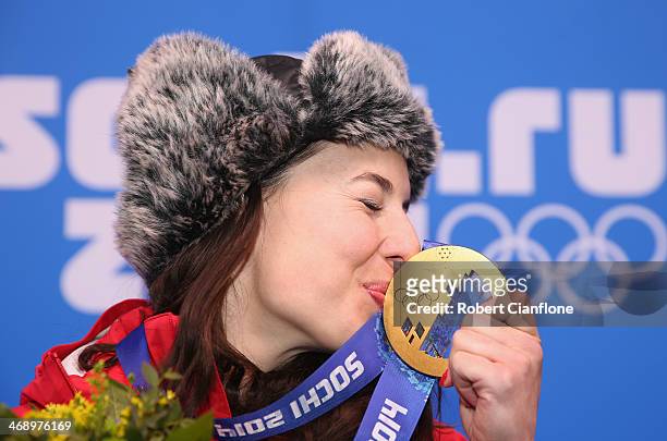 Gold medalist Dominique Gisin of Switzerland celebrates during the medal ceremony for the Alpine Skiing Women's Downhill on day five of the Sochi...