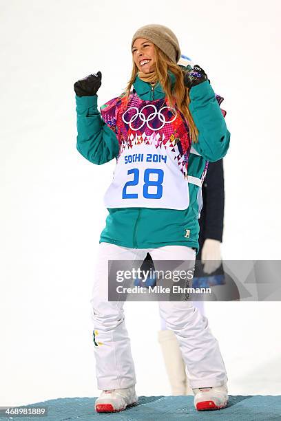 Silver medalist Torah Bright of Australia celebrates during the flower ceremony for the Snowboard Women's Halfpipe Finals on day five of the Sochi...