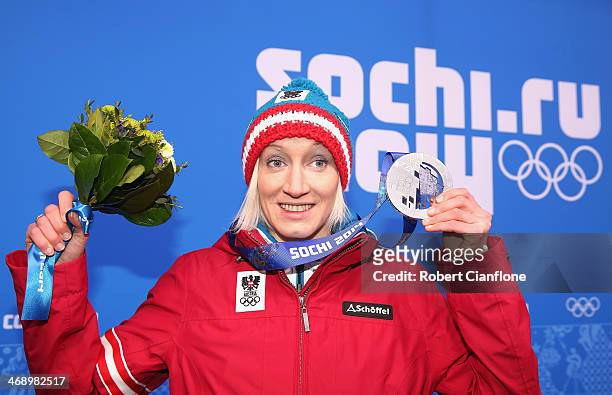 Silver medalist Daniela Iraschko-Stolz of Austria celebrates during the medal for the Ladies' Normal Hill Individual on day five of the Sochi 2014...