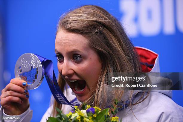 Silver medalist Ingvild Flugstad Oestberg of Norway celebrates during the medal ceremony for the Ladies' Sprint Free on day five of the Sochi 2014...