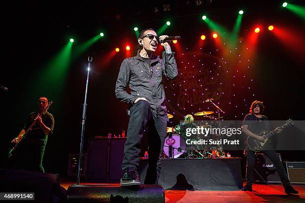 Robert DeLeo, Chester Bennington, Eric Kretz and Dean DeLeo of Stone Temple Pilots perform at Paramount Theatre on April 8, 2015 in Seattle,...