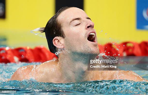 James Magnussen celebrates winning the Men's 50m Freestyle Final during day seven of the Australian National Swimming Championships at Sydney Olympic...