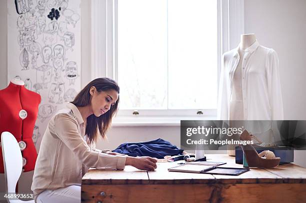 designing her new clothing line - fashion designer desk stock pictures, royalty-free photos & images