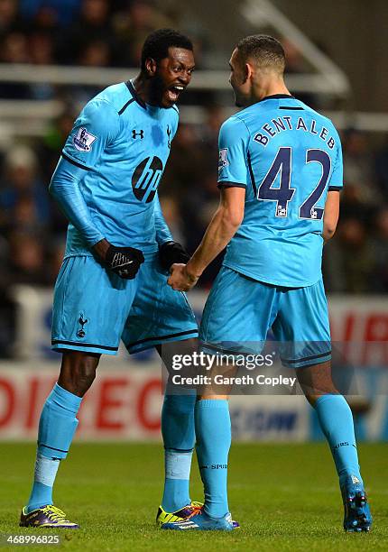 Emmanuel Adebayor of Tottenham Hotspur celebrates scoring the opening goal with Nabil Bentaleb during the Barclays Premier League match between...