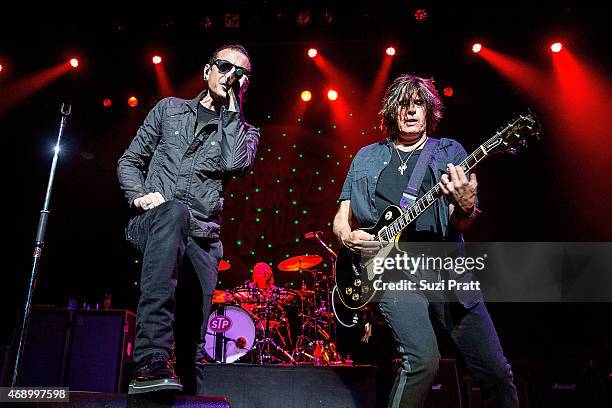 Chester Bennington, Eric Kretz and Dean DeLeo of Stone Temple Pilots perform at Paramount Theatre on April 8, 2015 in Seattle, Washington.