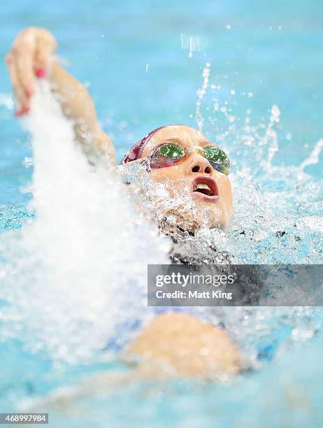 Madison Wilson competes in the Women's 200m Backstroke Final during day seven of the Australian National Swimming Championships at Sydney Olympic...