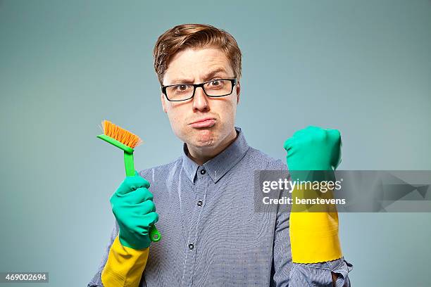 nerdy guy getting ready to clean - scrubbing brush stock pictures, royalty-free photos & images