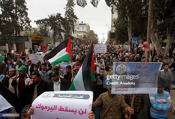 Group of Palestinians gathering at Gaza City's Tomb of the Unknown Soldier hold a protest demanding protection of Palestinian refugees and ending the...