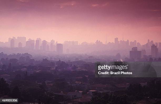 Sao Paulo cityscape showing air pollution and skyline of the city during sunset, Brazil.