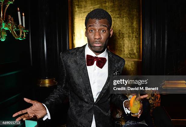 Wretch 32 attends a party hosted by EE and Esquire at The Savoy Hotel ahead of the 2014 EE British Academy Film Awards on February 12, 2014 in...