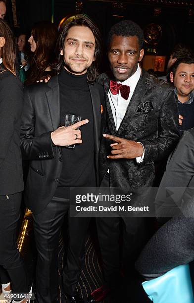 Luke Pasqualino and Wretch 32 attend a party hosted by EE and Esquire at The Savoy Hotel ahead of the 2014 EE British Academy Film Awards on February...