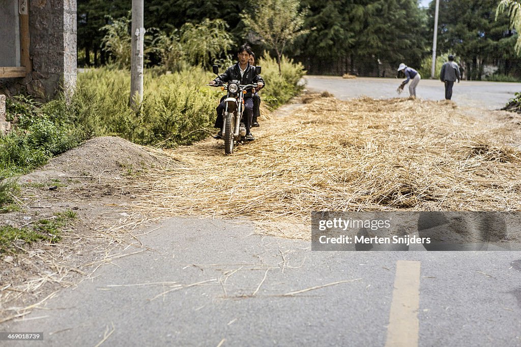 Motorcycle crossing an obstructed road