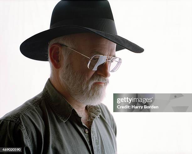 Writer Terry Pratchett is photographed for Live Night & Day magazine on April 29, 2001 in Bristol, England.