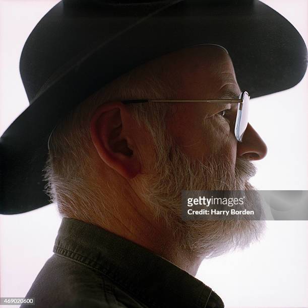 Writer Terry Pratchett is photographed for Live Night & Day magazine on April 29, 2001 in Bristol, England.