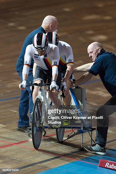 Eric Mohs and Tim Klienwechter of Germany at the startblock the MB 4km pursuit qualification race on March 28, 2015 in Apeldoorn, Netherlands.