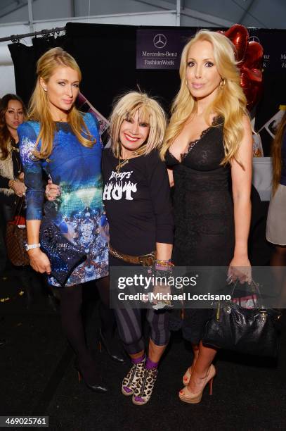 Paris Hilton, designer Betsey Johnson, and Lulu Johnson pose backstage at the Betsey Johnson fashion show during Mercedes-Benz Fashion Week Fall 2014...