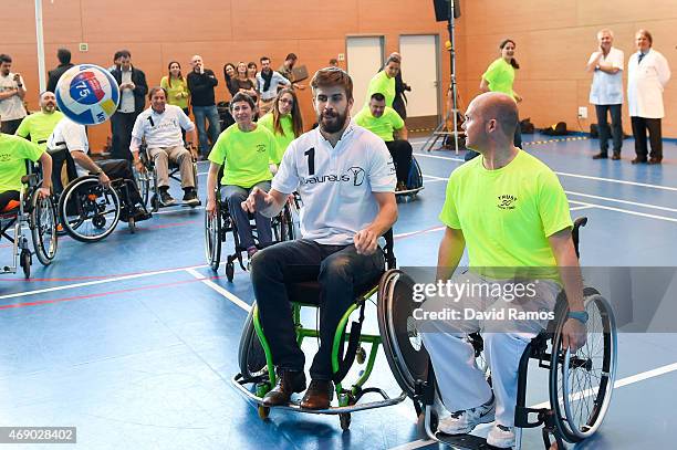 Laureus Ambassador and FC Barcelona player Gerard Pique in action during a korfball match at the Insitut Guttmann on April 9, 2015 in Barcelona,...