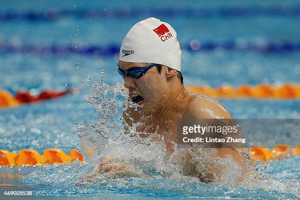 Li Xiang of China compete in the Men's 100 meters breaststroke semifinal on day one of the China National Swimming Championships on April 9, 2015 in...