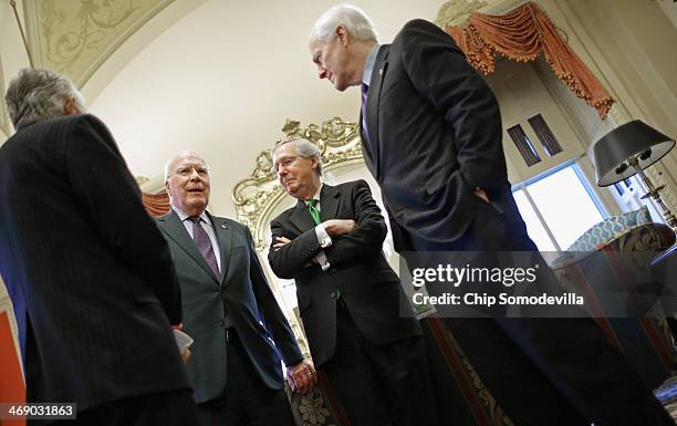 Senate Majority Leader Harry Reid , Sen. Patrick Leahy , Senate Minority Leader Mitch McConnell and Sen. John Cornyn wait for the arrival of Jordan's...