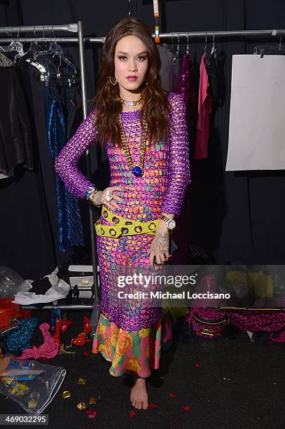 Model prepares backstage at the Marist College Presents Betsey Johnson Reprise fashion show during Mercedes-Benz Fashion Week Fall 2014 at The Salon...