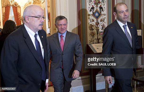 King Abdullah II of Jordan leaves a meeting with the Senate Foreign Relations Committee at the US Capitol in Washington, DC, on February 12, 2014....