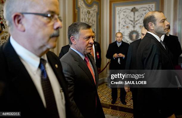 King Abdullah II of Jordan leaves a meeting with the Senate Foreign Relations Committee at the US Capitol in Washington, DC, on February 12, 2014....