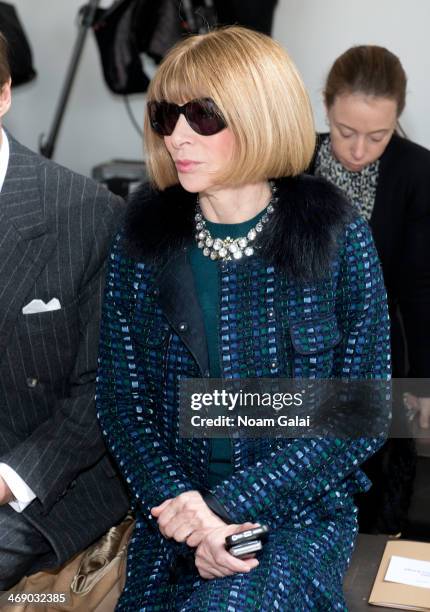 Anna Wintour attends the Michael Kors Show during Mercedes-Benz Fashion Week Fall 2014 at Spring Studios on February 12, 2014 in New York City.